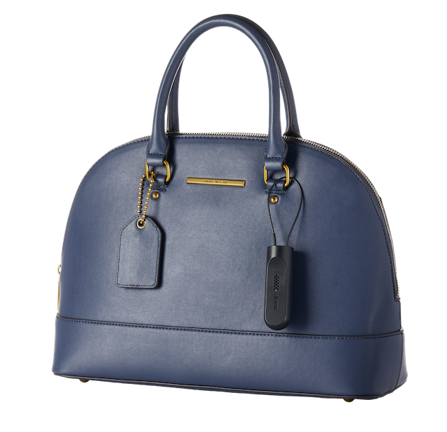 Kabelschloss an der Handtasche für die Warensicherung im Verkauf